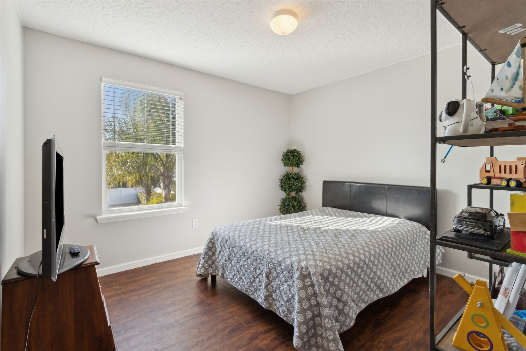 95029 Lavender Lane Fernandina Beach, FL 32034 - Photo 39 of 64 a bedroom with a bed table closet and a window