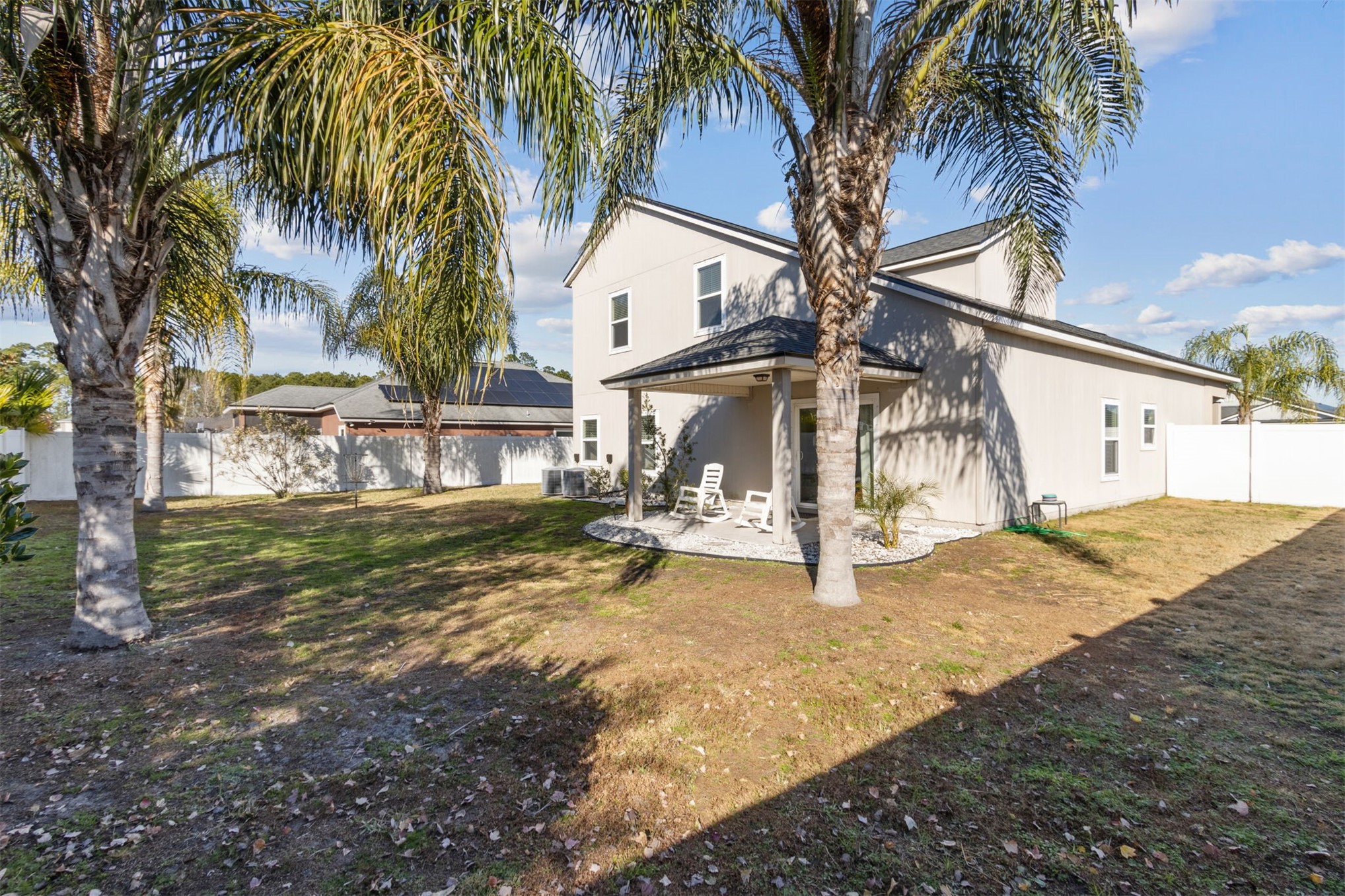 95029 Lavender Lane Fernandina Beach, FL 32034 - Photo 46 of 64 a view of a house with swimming pool