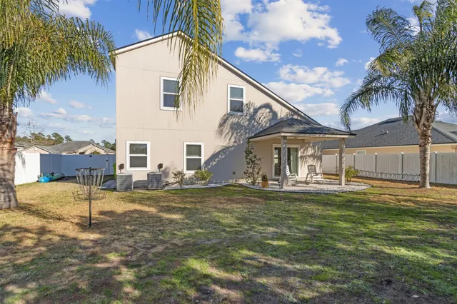 a view of an chairs and tables in the patio