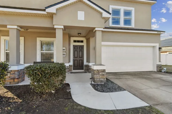 a view of a porch with seating space