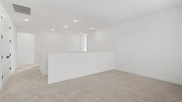 a view of room with window and walk in closet