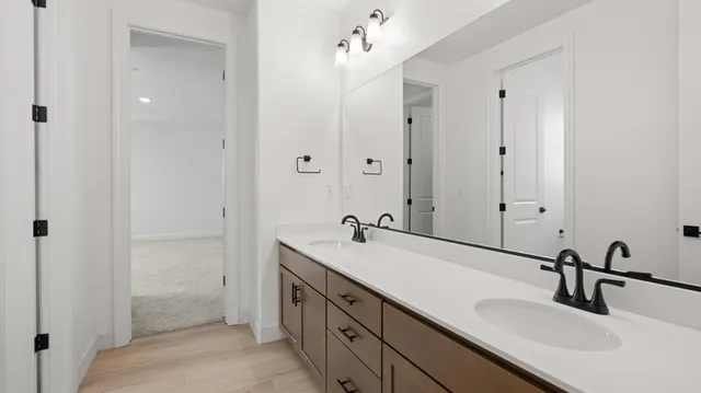 a bathroom with a toilet and a bathtub