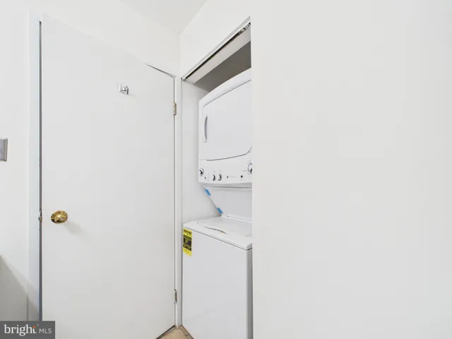 a bathroom with a sink a mirror and shower
