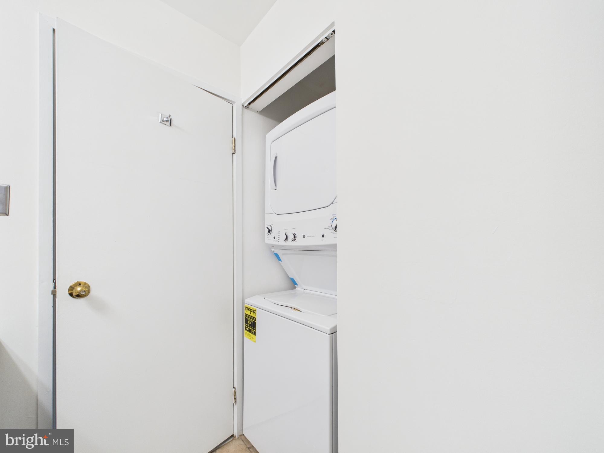 1601 Spring Garden Street, Unit 402 Philadelphia, PA 19130 - Photo 17 of 22 a bathroom with a sink a mirror and shower