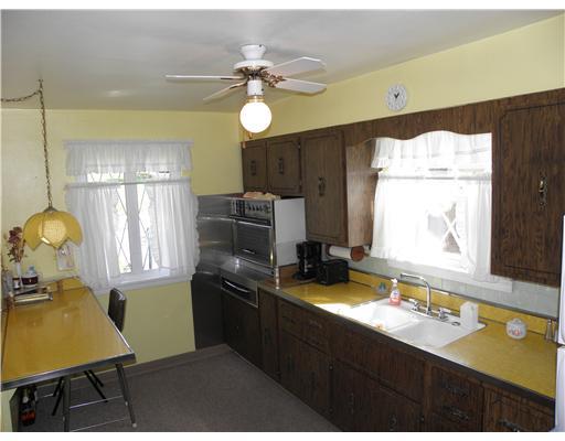 254 Streets Run Road Whitehall, PA 15236 - Photo 8 of 18 Kitchen. Great Breakfast Bar in Kitchen w/ Built-in Electric Oven & Retractable Stove Top, Gargage Disposal and Refrigerator included!!