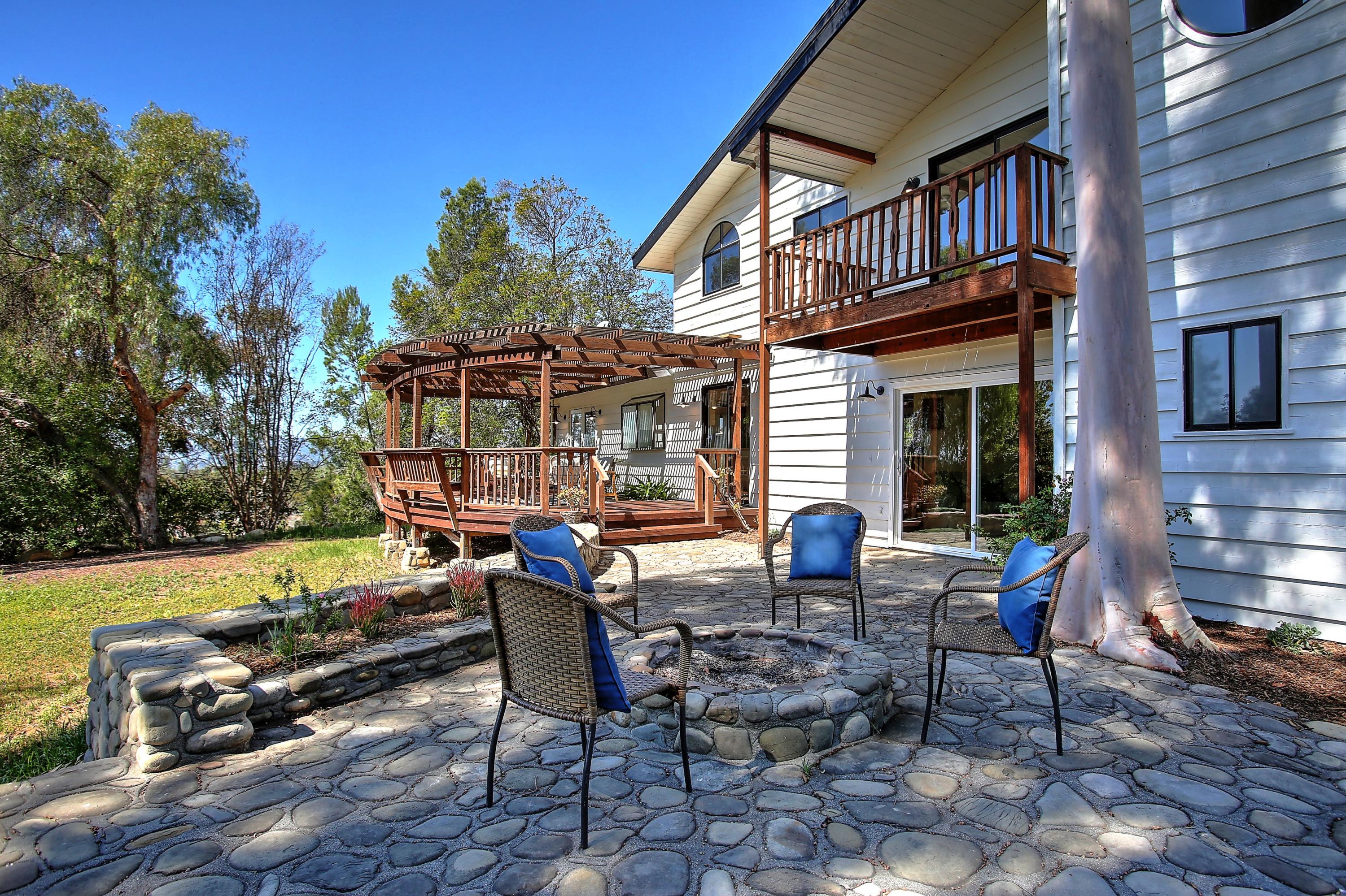 2080 Maricopa Highway Ojai, CA 93023 - Photo 20 of 47 a view of a chairs and table in the patio