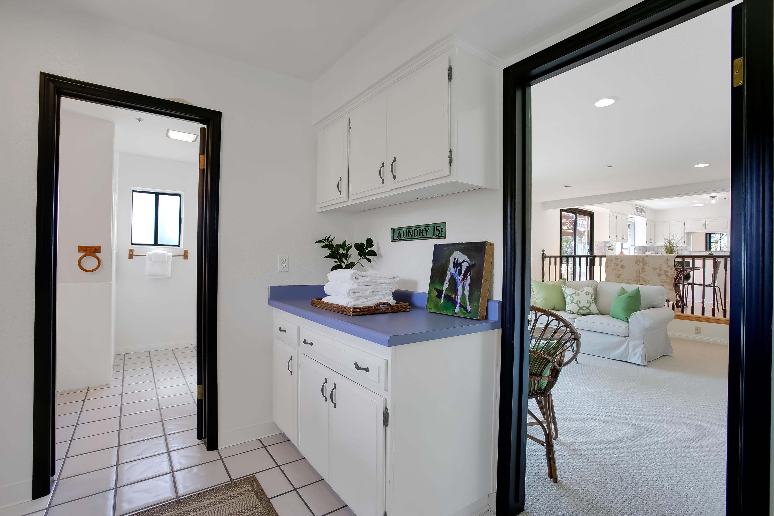 2080 Maricopa Highway Ojai, CA 93023 - Photo 23 of 47 a hallway with a view of living room and wooden floor