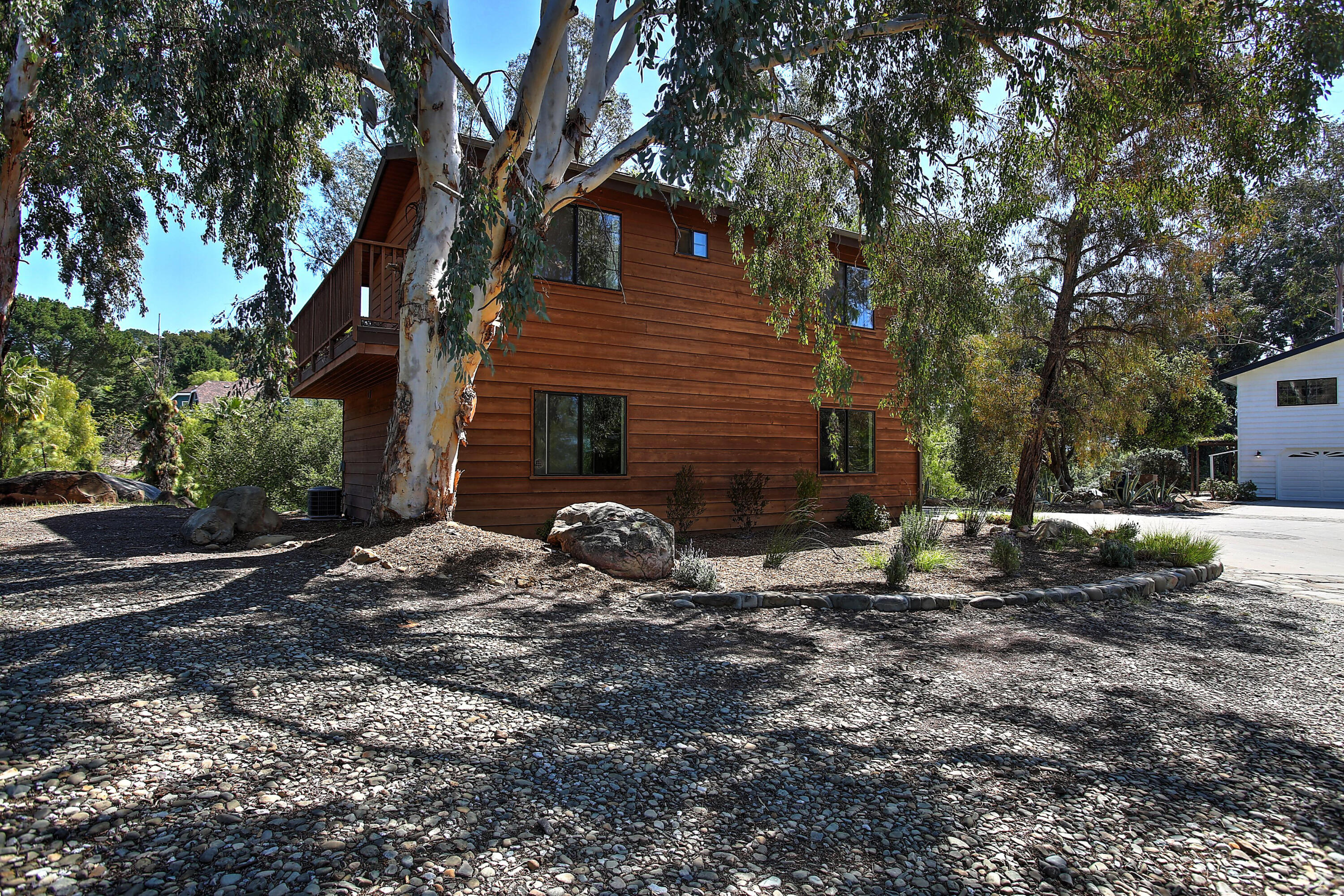 2080 Maricopa Highway Ojai, CA 93023 - Photo 25 of 47 a backyard of a house with table and chairs