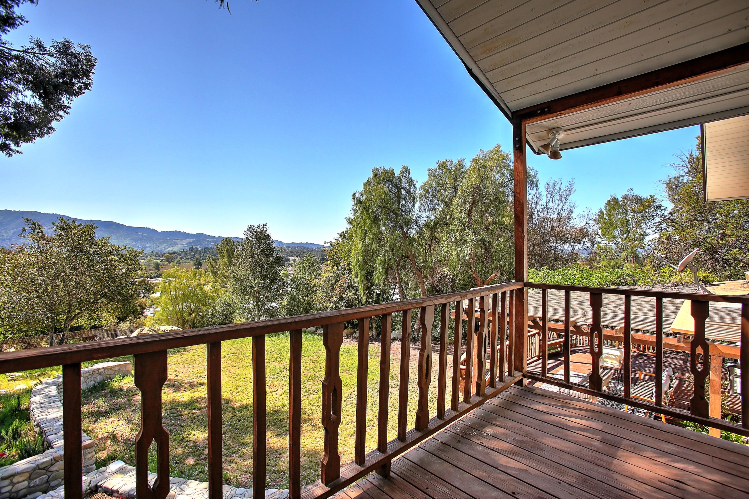 2080 Maricopa Highway Ojai, CA 93023 - Photo 30 of 47 a balcony with wooden floor and outdoor space