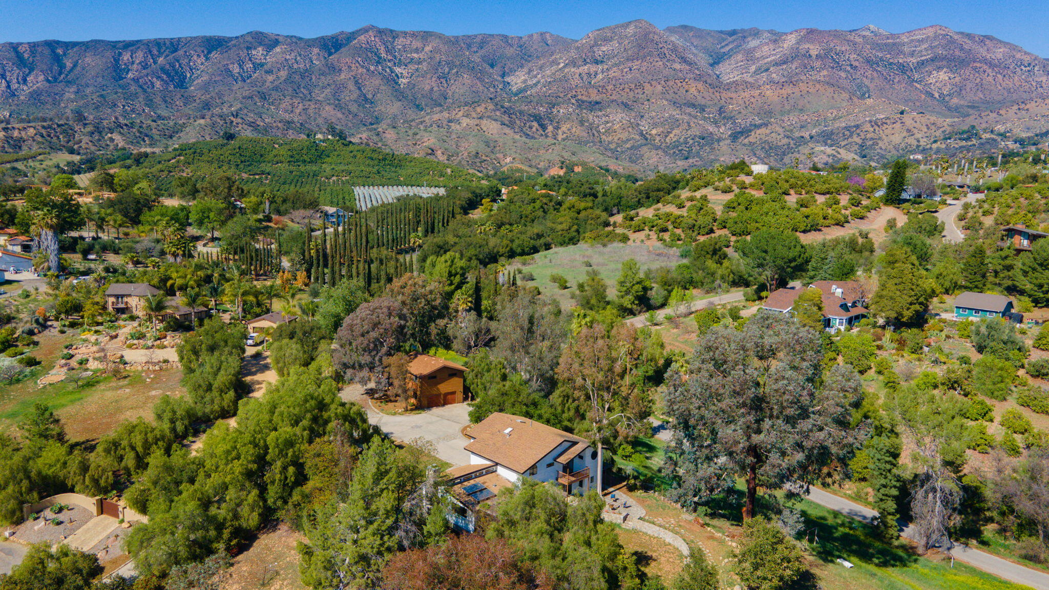 2080 Maricopa Highway Ojai, CA 93023 - Photo 42 of 47 a view of a lush green hillside and houses