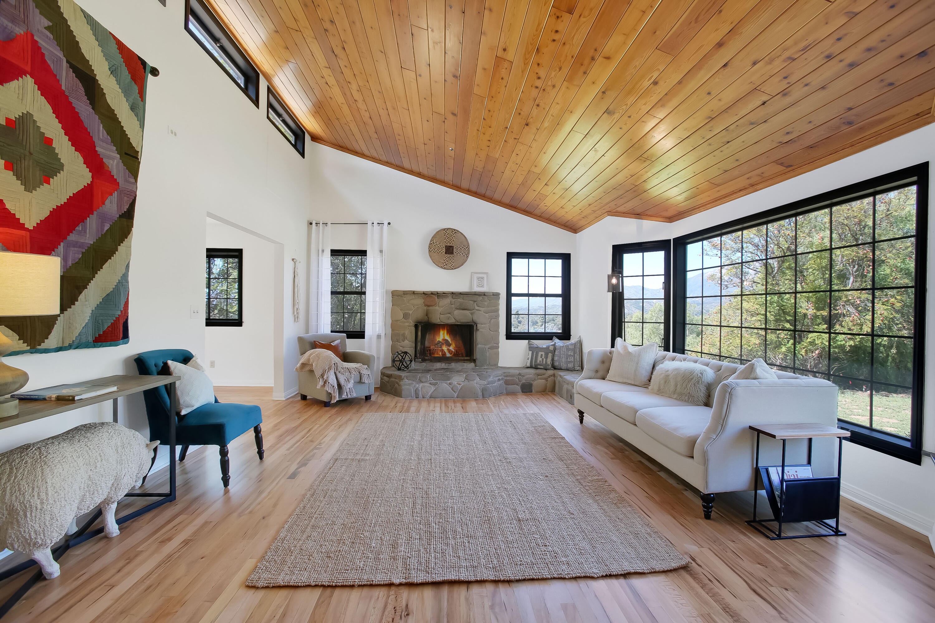 2080 Maricopa Highway Ojai, CA 93023 - Photo 5 of 47 a living room with furniture large window and a fireplace