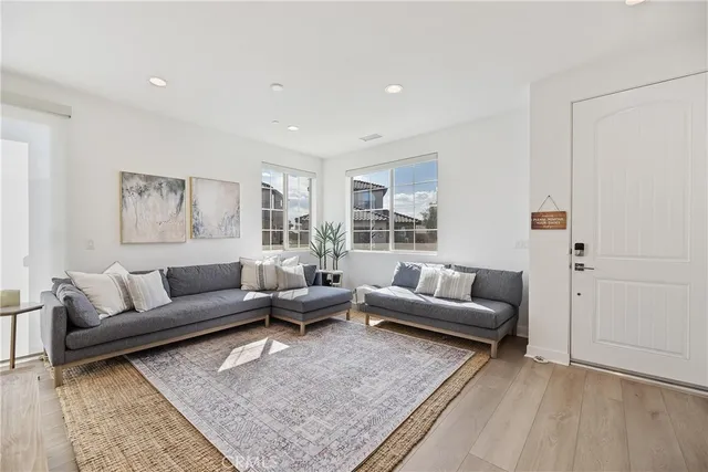 a living room with furniture and a couch