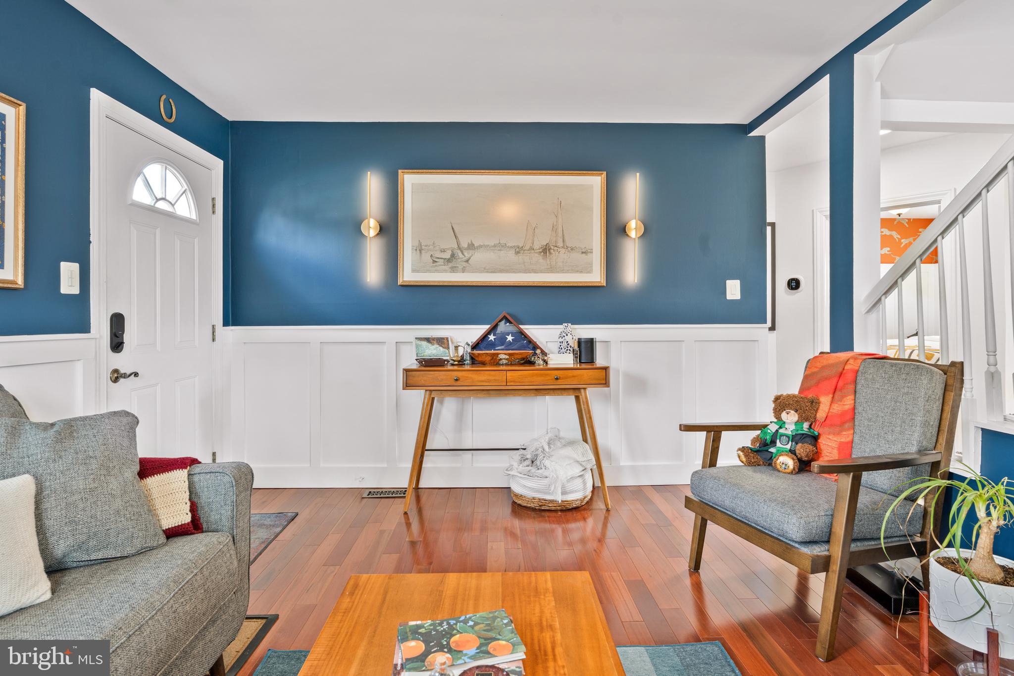 7745 Garrison Road Hyattsville, MD 20784 - Photo 12 of 43 a living room with furniture and a wooden floor