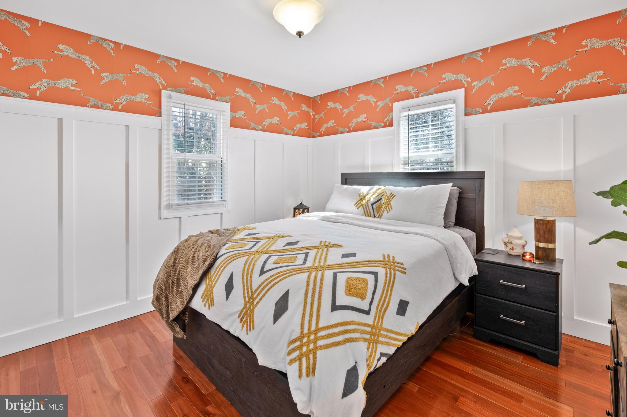 7745 Garrison Road Hyattsville, MD 20784 - Photo 13 of 43 a bedroom with a bed and a window with the outer view