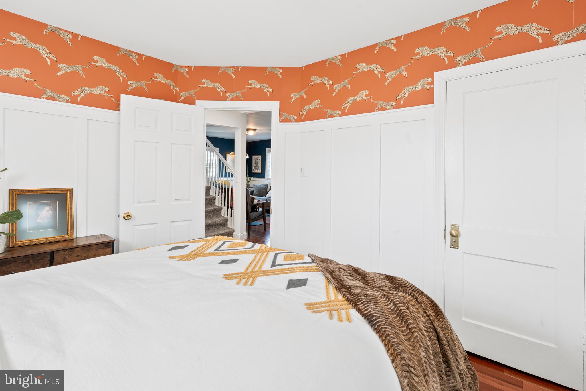 7745 Garrison Road Hyattsville, MD 20784 - Photo 14 of 43 a bedroom with a bed and a flat screen tv