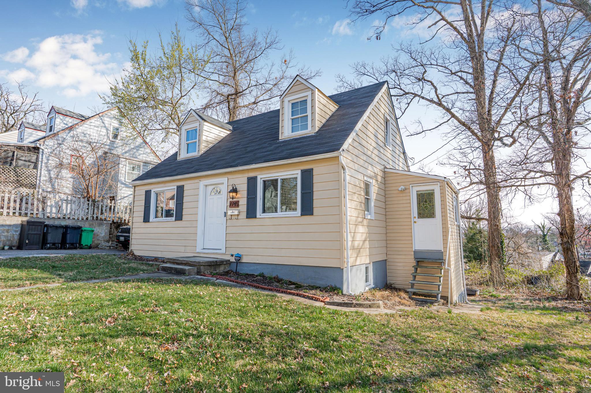 7745 Garrison Road Hyattsville, MD 20784 - Photo 2 of 43 a view of a house with a yard