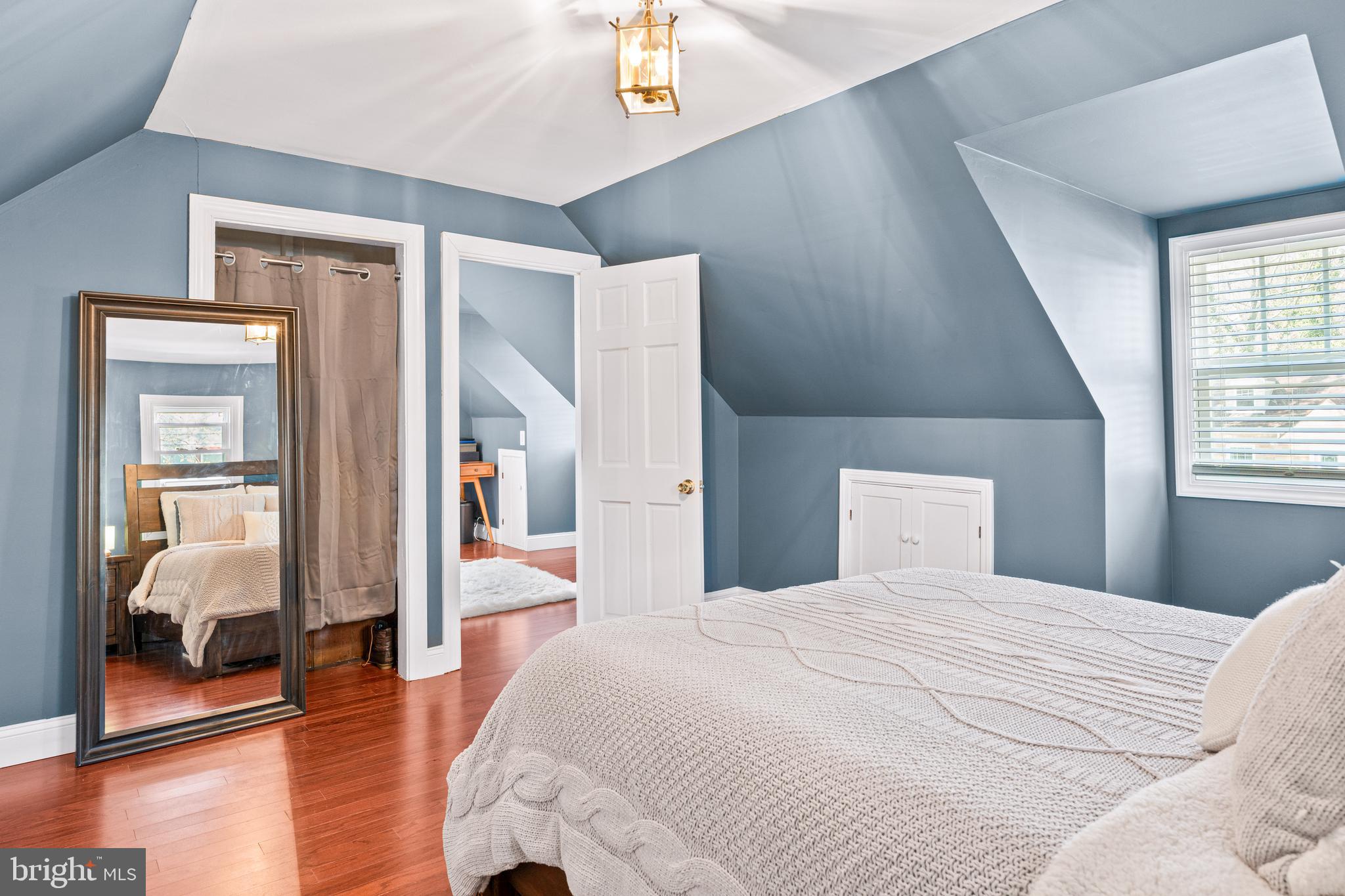 7745 Garrison Road Hyattsville, MD 20784 - Photo 24 of 43 a bedroom with a large bed and a walk in closet