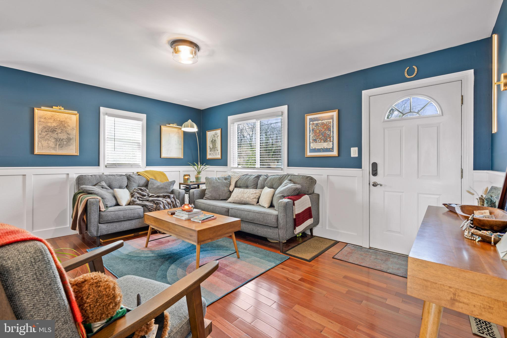 7745 Garrison Road Hyattsville, MD 20784 - Photo 34 of 43 a living room with furniture and wooden floor