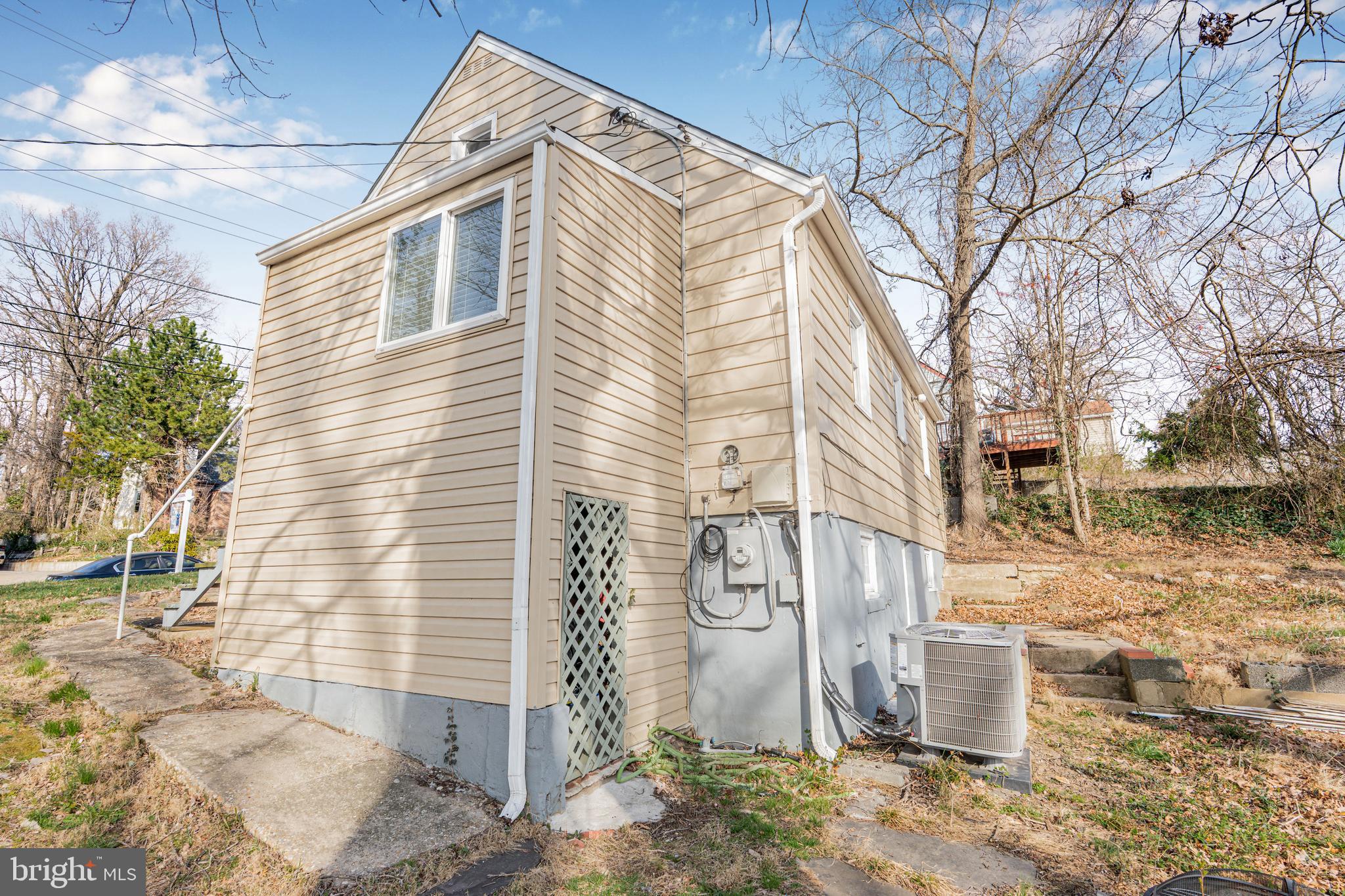 7745 Garrison Road Hyattsville, MD 20784 - Photo 39 of 43 a view of a house with a yard