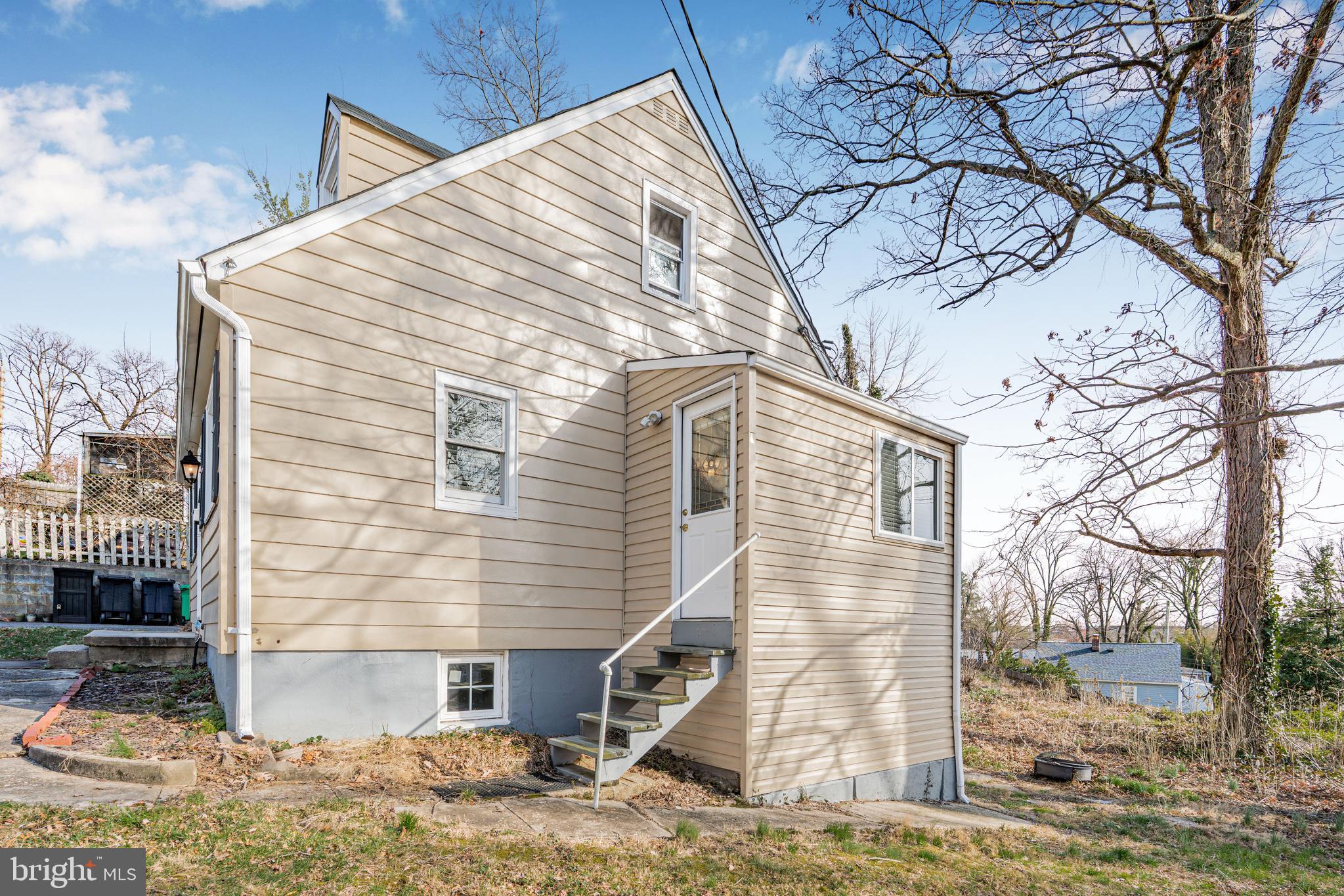 7745 Garrison Road Hyattsville, MD 20784 - Photo 40 of 43 a view of a house with a yard
