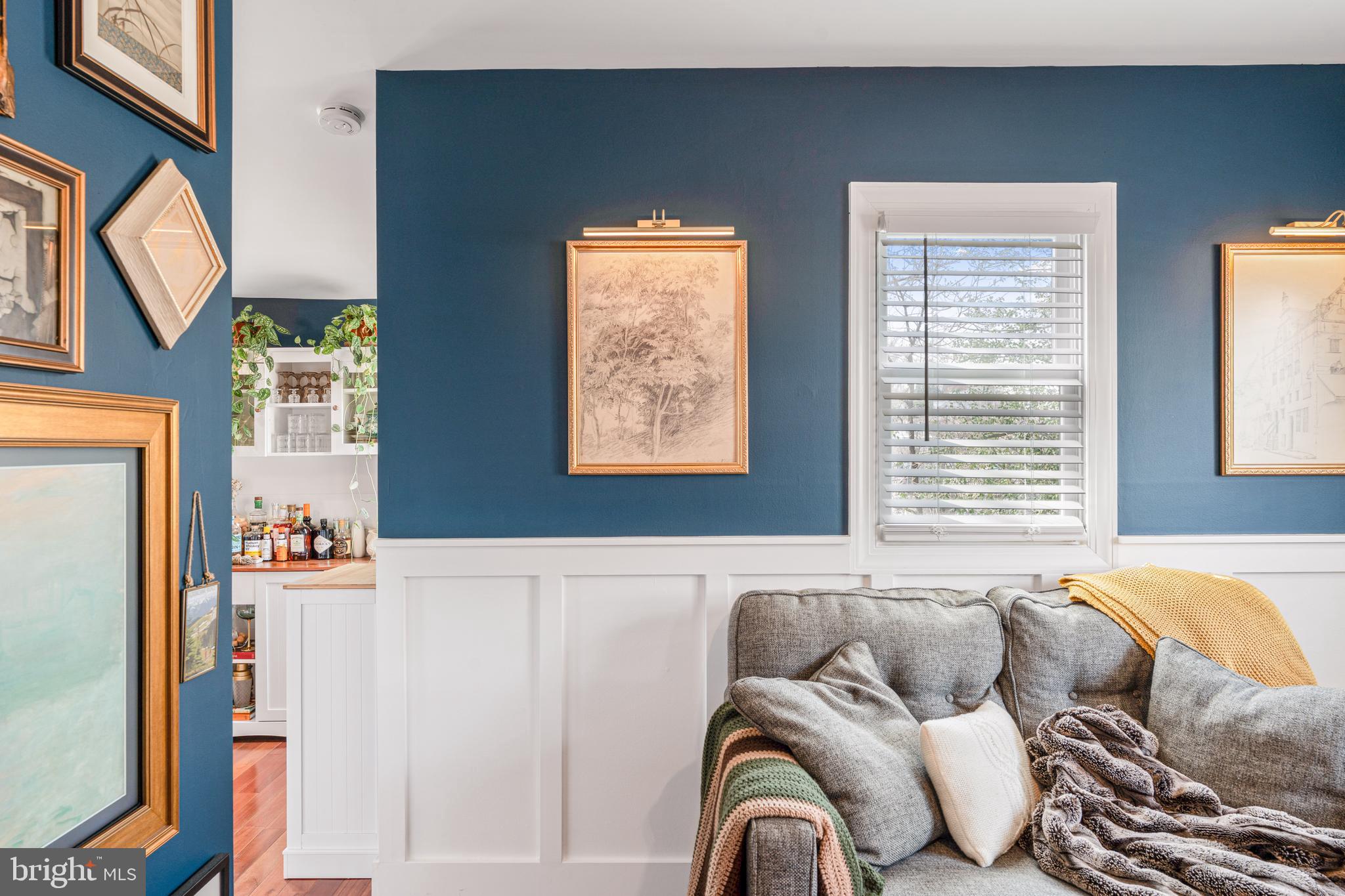 7745 Garrison Road Hyattsville, MD 20784 - Photo 6 of 43 a living room with furniture and a large window