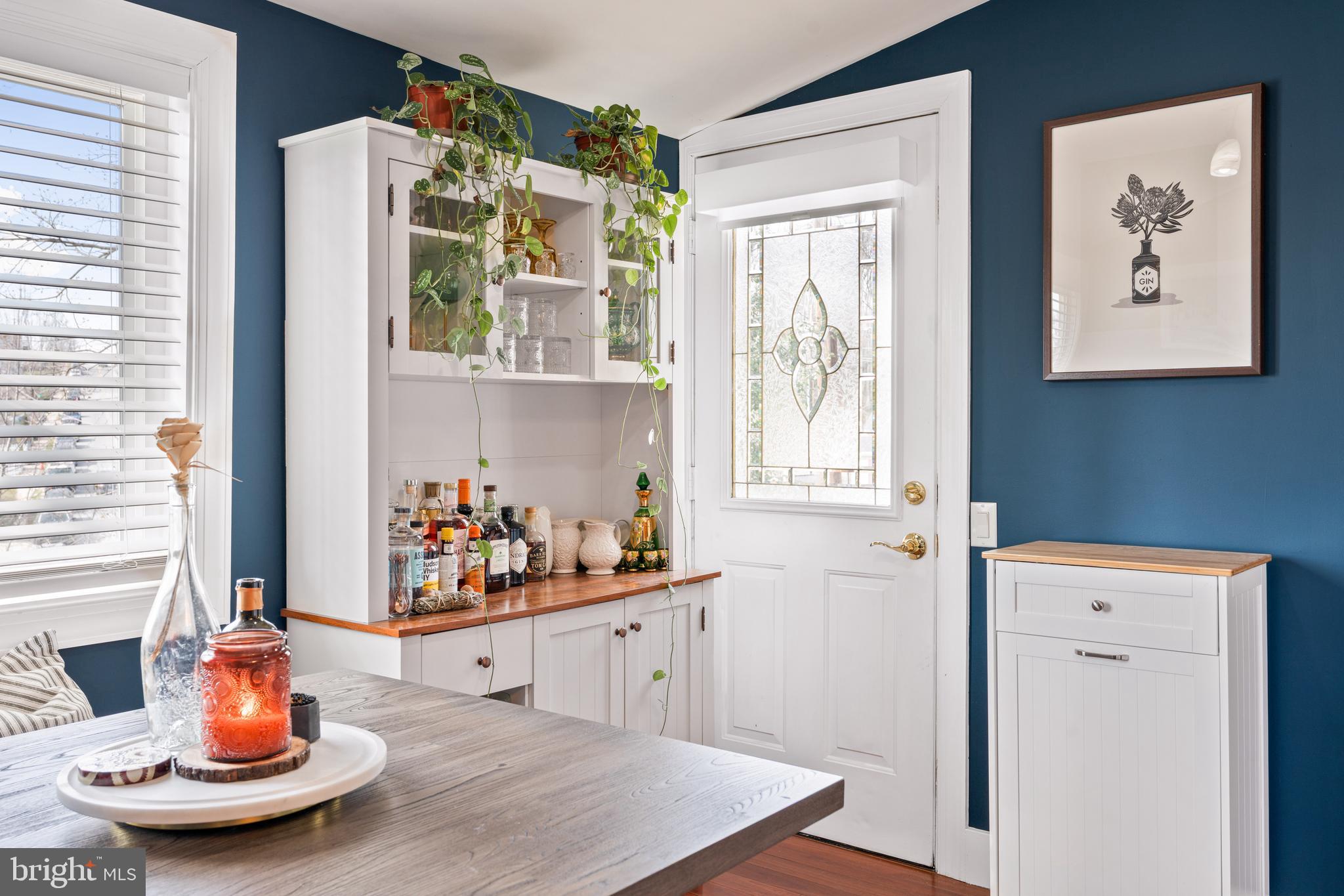 7745 Garrison Road Hyattsville, MD 20784 - Photo 8 of 43 a room with a window and flowerpot