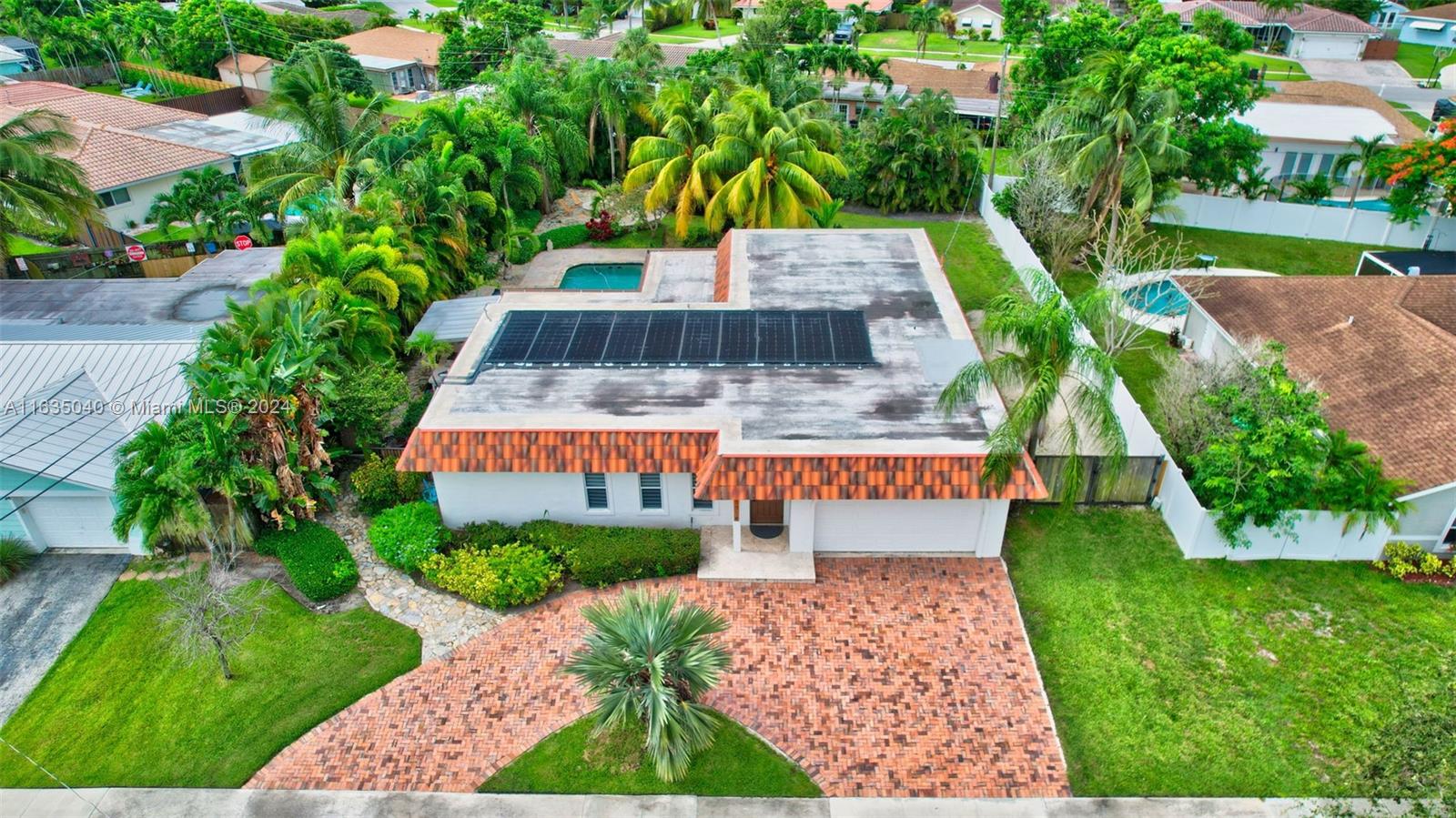 1314 Northwest 6th Street Boca Raton, FL 33486 - Photo 54 of 66 Solar Panel on roof for the pool heating