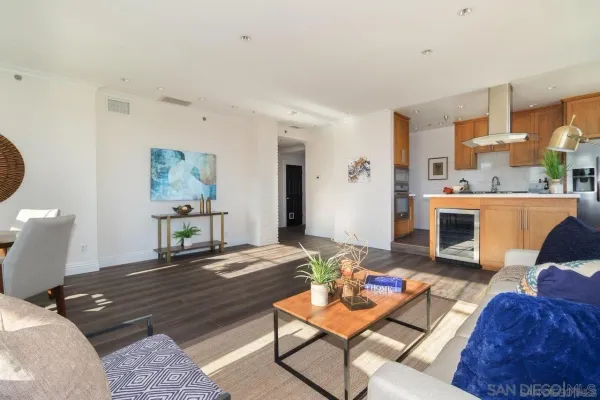 a living room with furniture and a couch