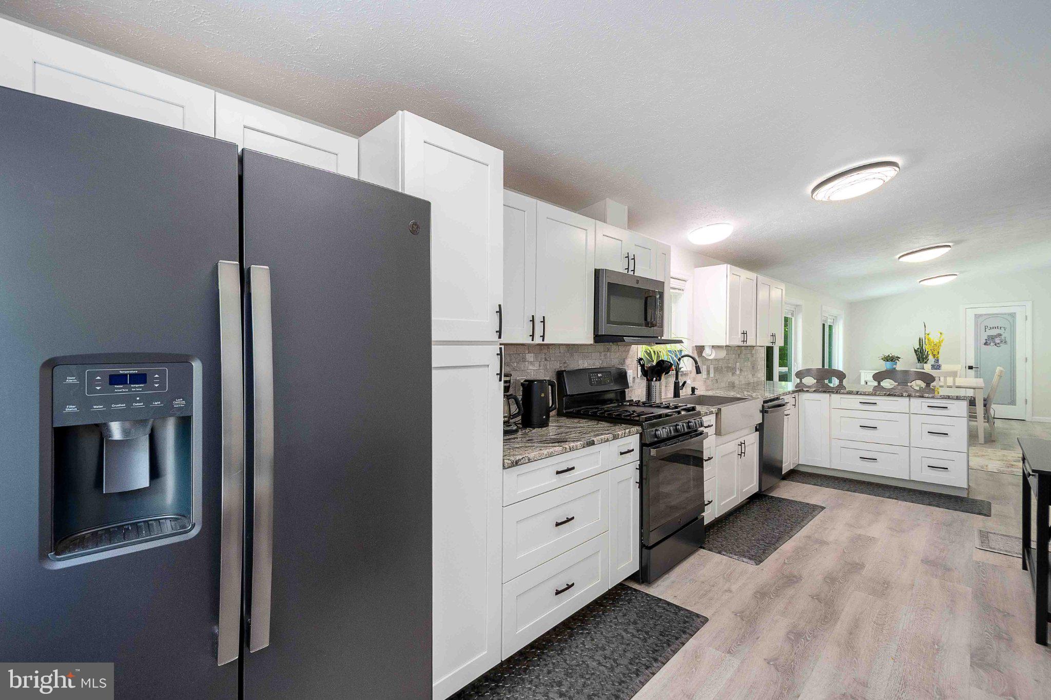 511 Hill Top Road Oakland, MD 21550 - Photo 16 of 51 Modern kitchen with sleek finishes.