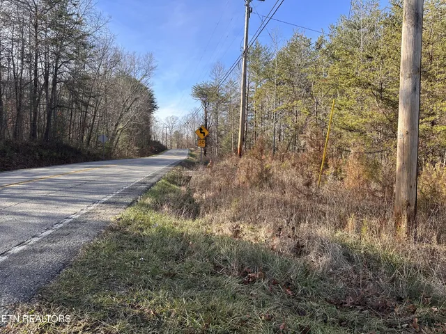 a view of a backyard of the house