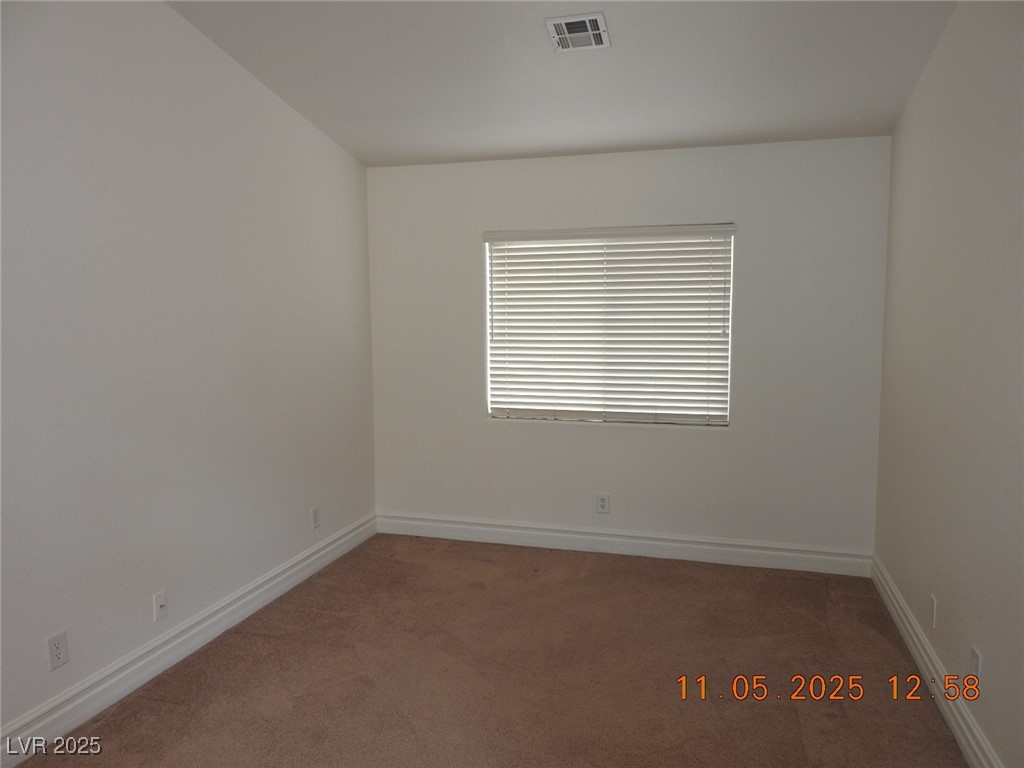 240 Rustic Club Way Las Vegas, NV 89148 - Photo 16 of 40 Spare room with carpet floors