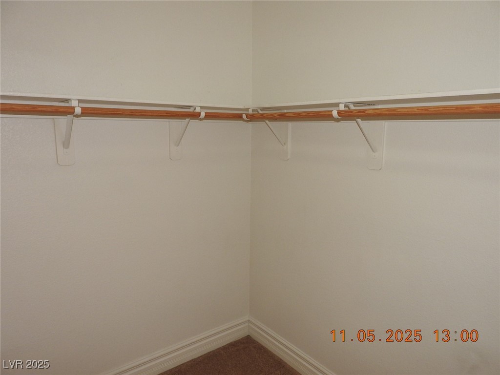240 Rustic Club Way Las Vegas, NV 89148 - Photo 25 of 40 Spacious closet featuring carpet floors