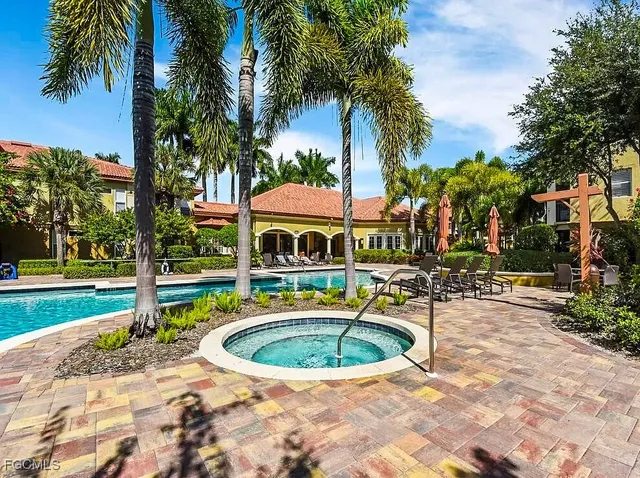 a view of a swimming pool with a garden