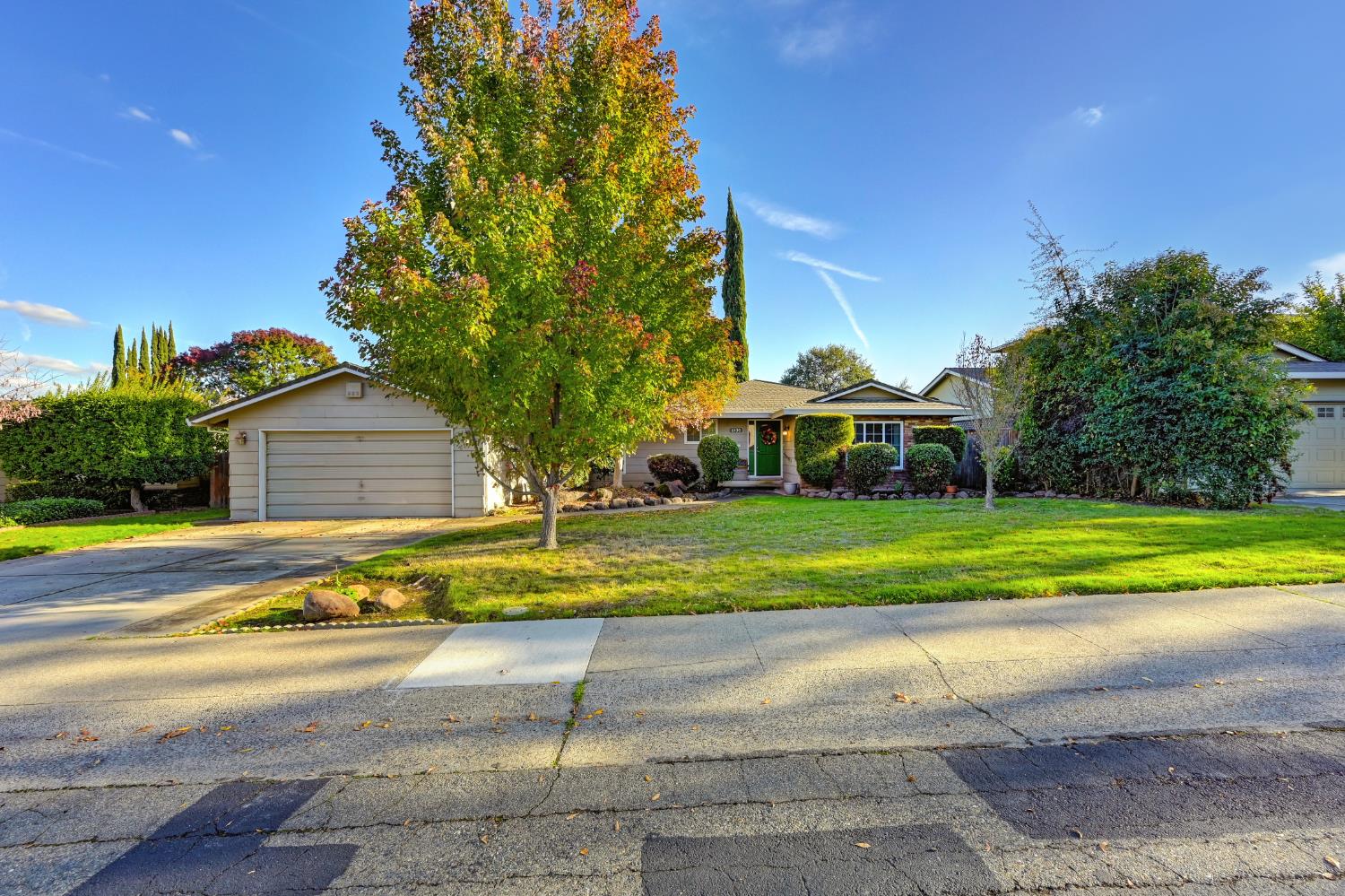 6430 Sandstone Street Carmichael, CA 95608 - Photo 2 of 39 a view of a house with a yard