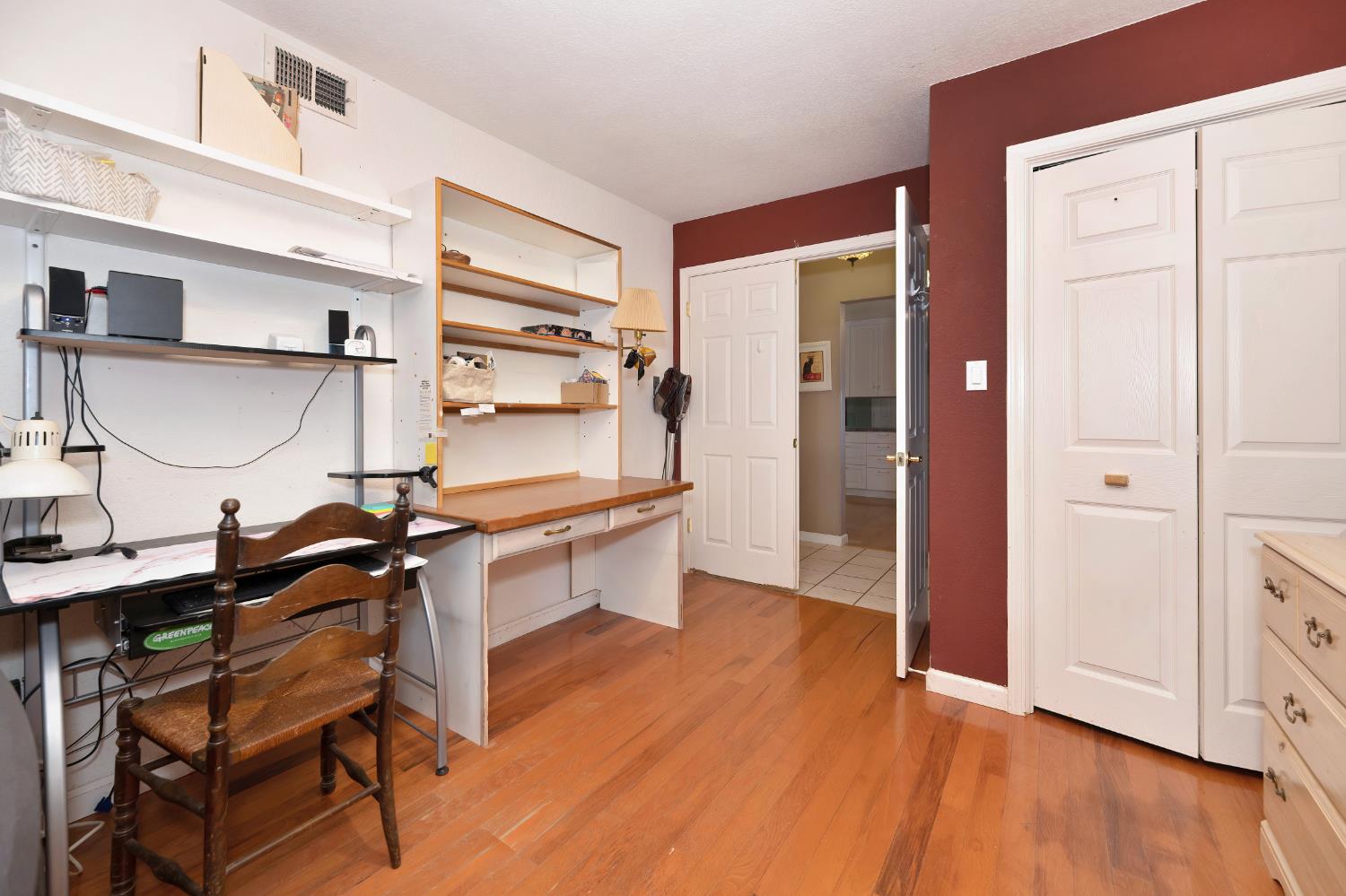 6430 Sandstone Street Carmichael, CA 95608 - Photo 21 of 39 a room with gym equipment and wooden floor