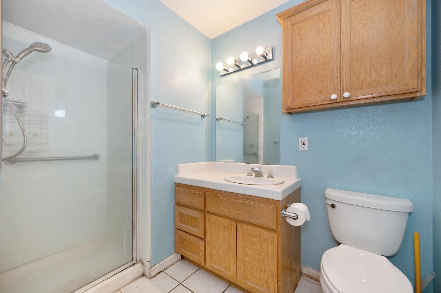 6430 Sandstone Street Carmichael, CA 95608 - Photo 25 of 39 a bathroom with a sink a toilet and shower