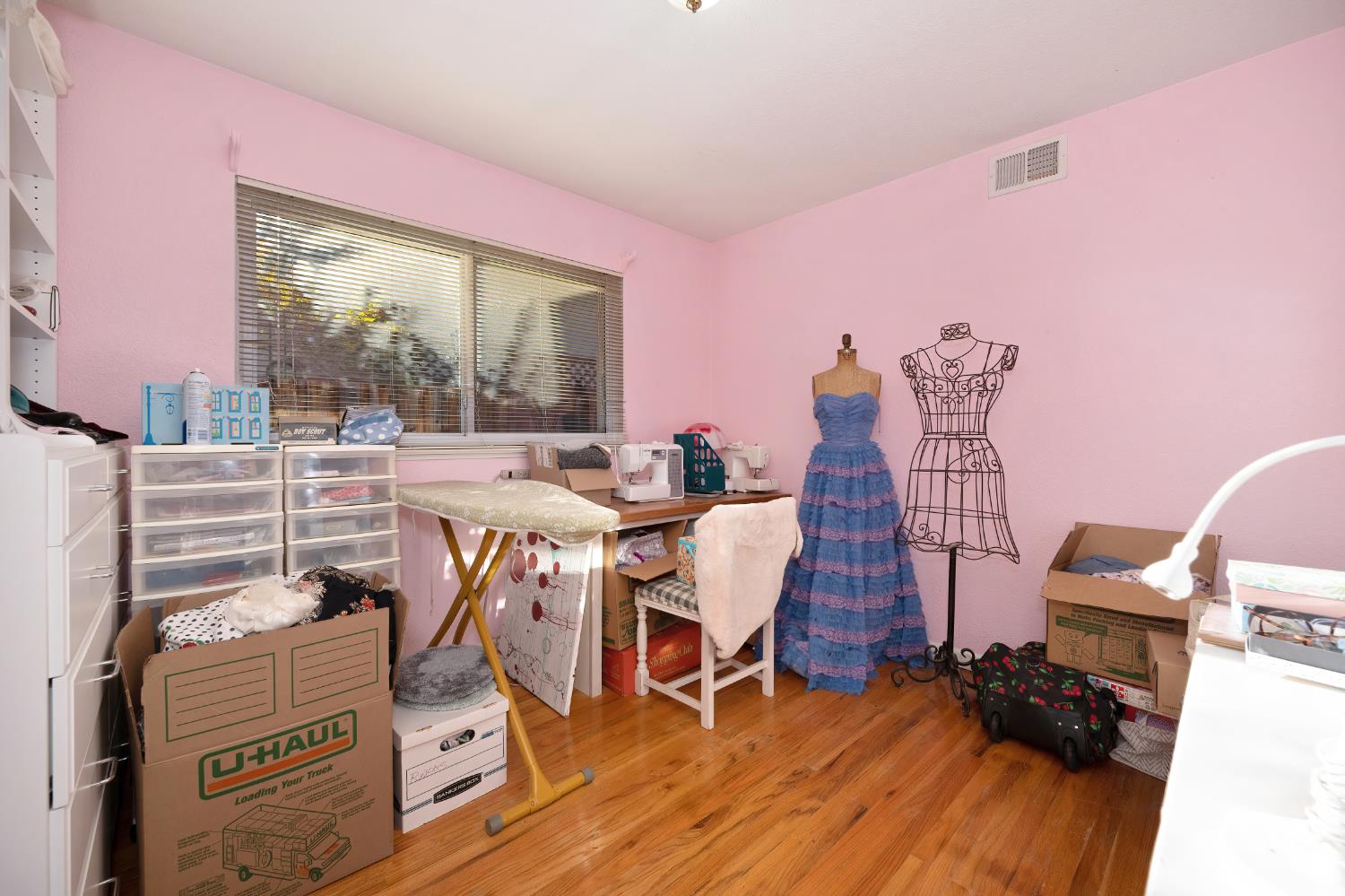 6430 Sandstone Street Carmichael, CA 95608 - Photo 26 of 39 a view of a workspace with furniture and a large window