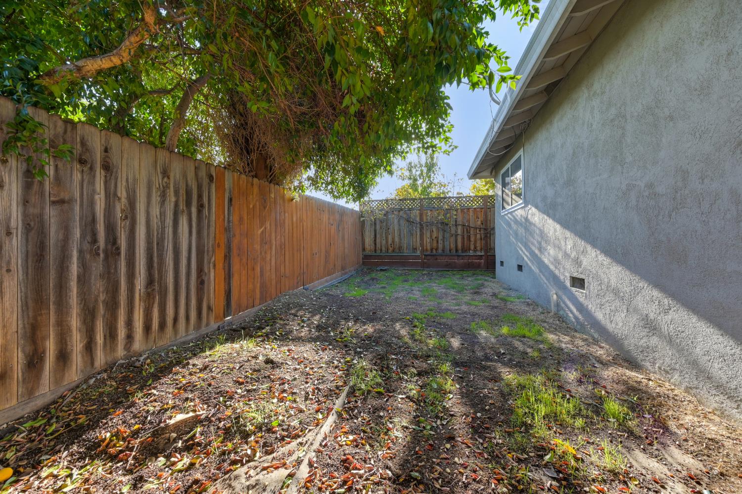 6430 Sandstone Street Carmichael, CA 95608 - Photo 35 of 39 a view of a pathway of a wooden fence