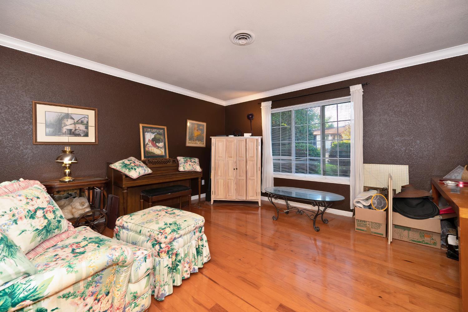 6430 Sandstone Street Carmichael, CA 95608 - Photo 8 of 39 a bedroom with furniture and a window