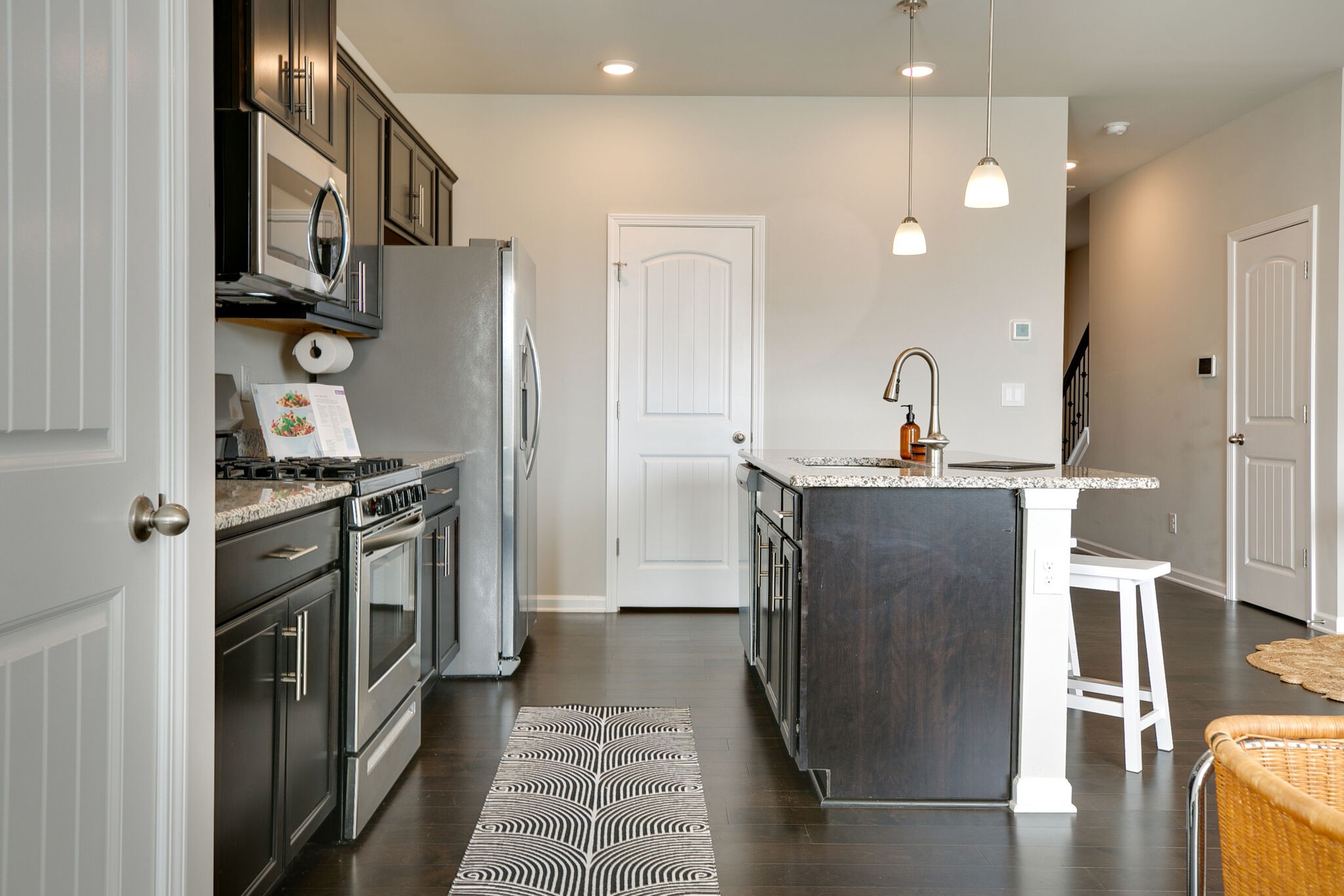 4283 Grapevine Loop Smyrna, TN 37167 - Photo 11 of 30 a kitchen with stainless steel appliances granite countertop a refrigerator and a sink