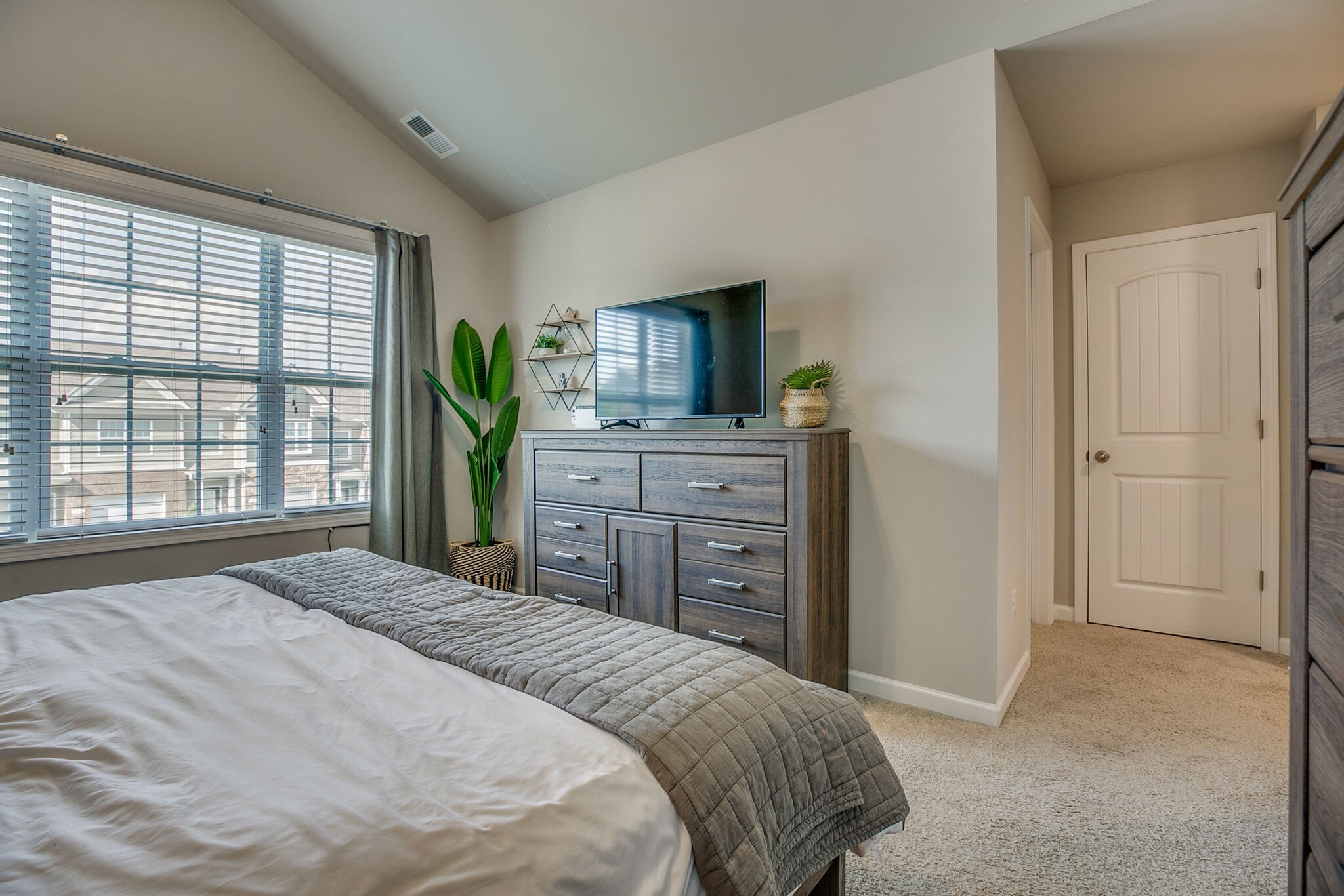 4283 Grapevine Loop Smyrna, TN 37167 - Photo 18 of 30 a bedroom with a bed and a dresser