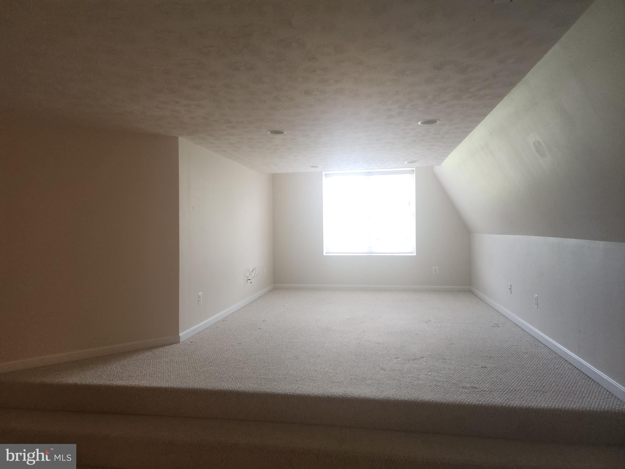 36548 Notley Hall Road, Unit A Chaptico, MD 20621 - Photo 5 of 8 a view of empty room with window