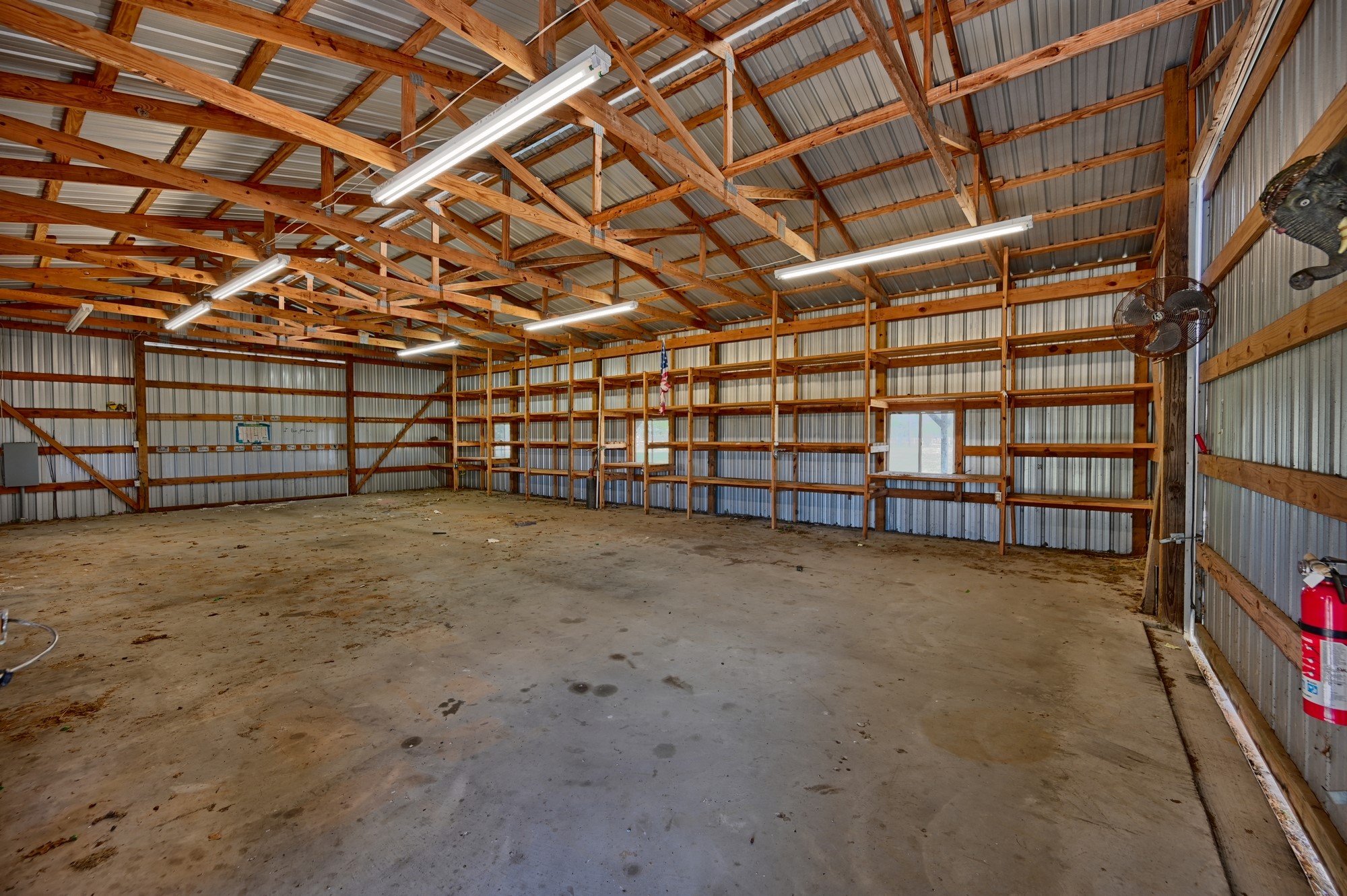350 Owl Creek Road Giddings, TX 78942 - Photo 2 of 29 Garage featuring metal wall
