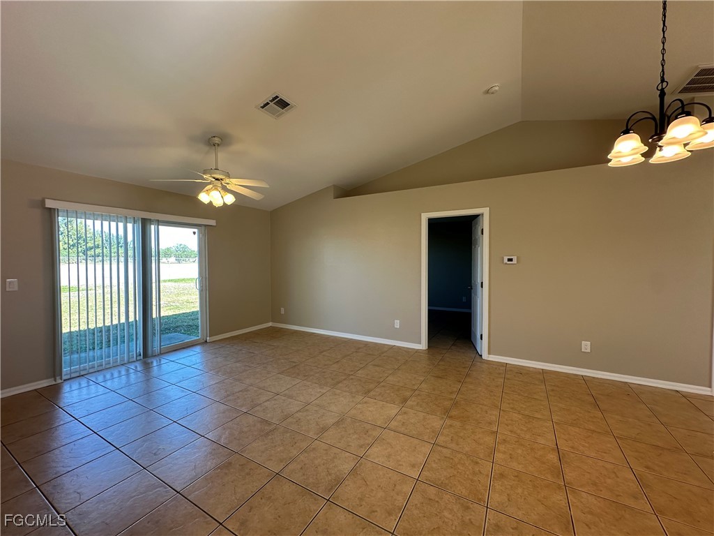 2411 Park Road, Unit 2409 Lehigh Acres, FL 33971 - Photo 13 of 20 a view of an empty room with a window