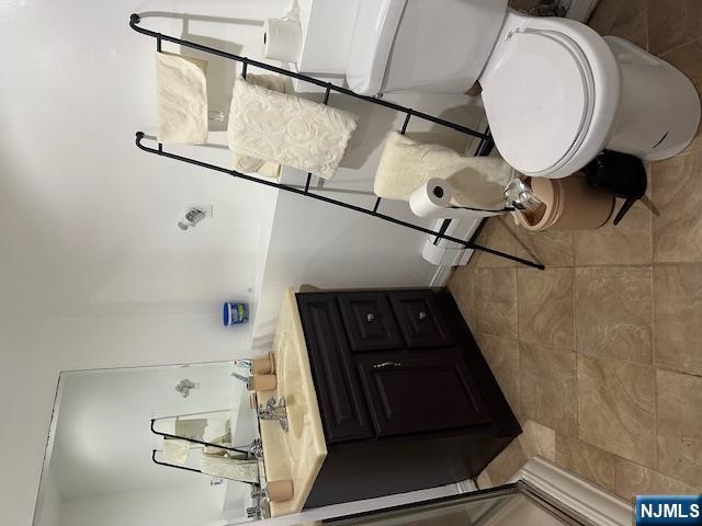 149 Oldham Road Wayne, NJ 07470 - Photo 13 of 19 a bathroom with a toilet sink and mirror