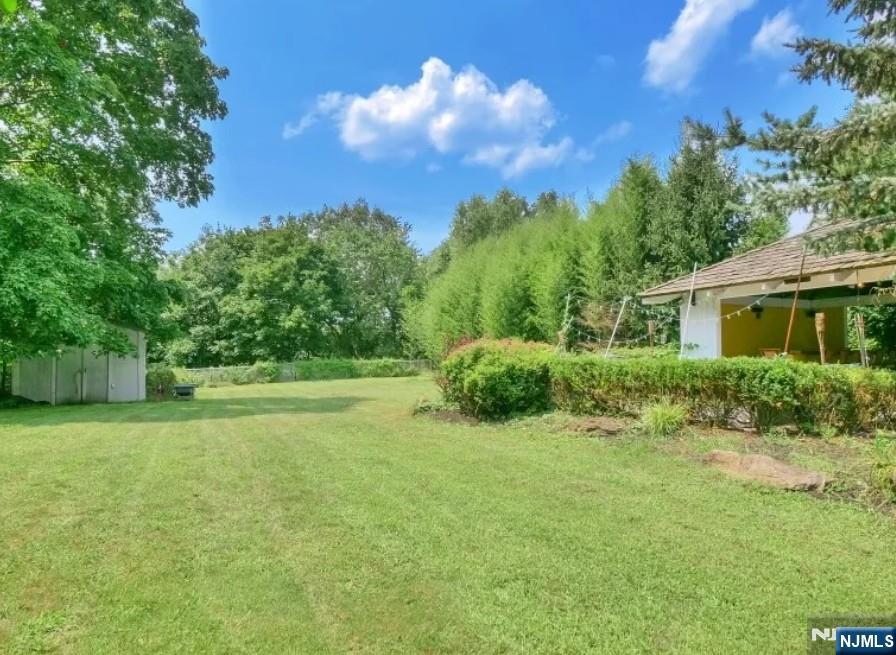 149 Oldham Road Wayne, NJ 07470 - Photo 18 of 19 a view of a house with a backyard