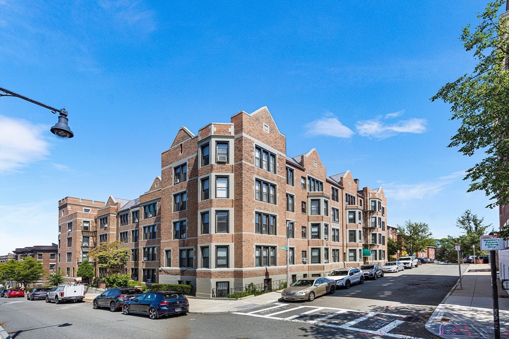 a view of a building and a street