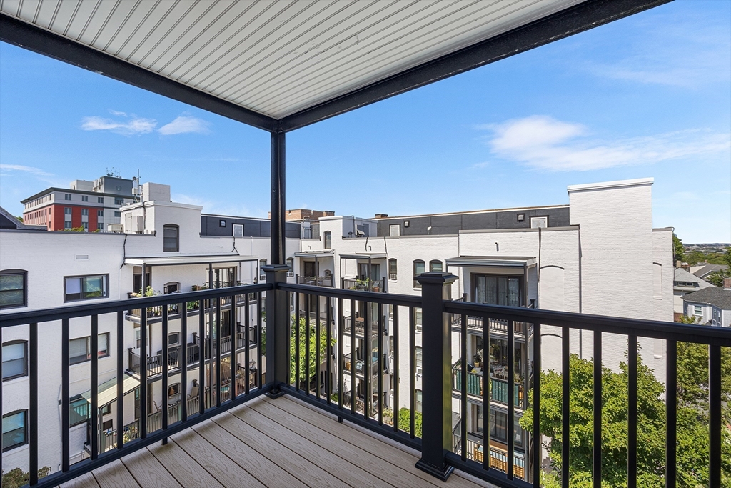 4 Commonwealth Court, Unit 20 Boston, MA 02135 - Photo 16 of 22 a view of city from a balcony
