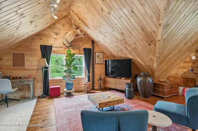 a outdoor space with patio furniture and a fireplace