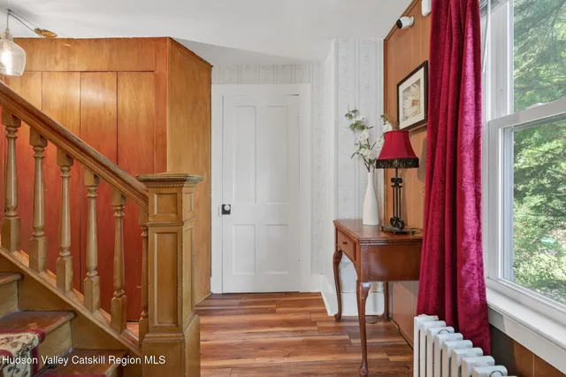 a view of a entryway with furniture and stairs